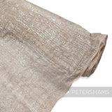 Petershams Millinery Supplies hand woven metallic lurex sinamay fabric in a shimmering champagne tone.