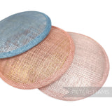 Petershams Millinery Supplies round sinamay fascinator bases in blue, peach, and pink with metallic lurex finish.