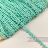Petershams Millinery Supplies vintage 1950s English mint green cotton guipure lace trim with a teeny leafy design