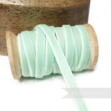 Petershams Millinery Supplies 9mm wide vintage mint green rayon velvet ribbon on a wooden spool
