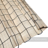 Petershams Millinery Supplies natural sinamay abaca fabric with a black wool yarn square check pattern