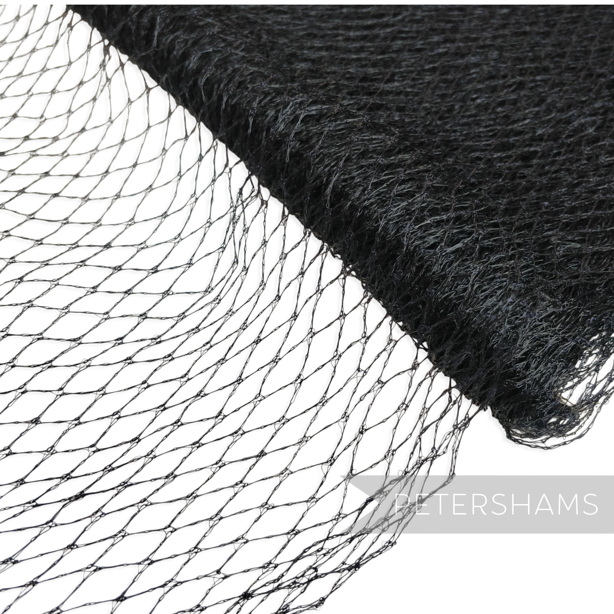 Petershams Millinery Supplies vintage dark navy blue fishnet veiling with a soft drape and 10mm diamond pattern.