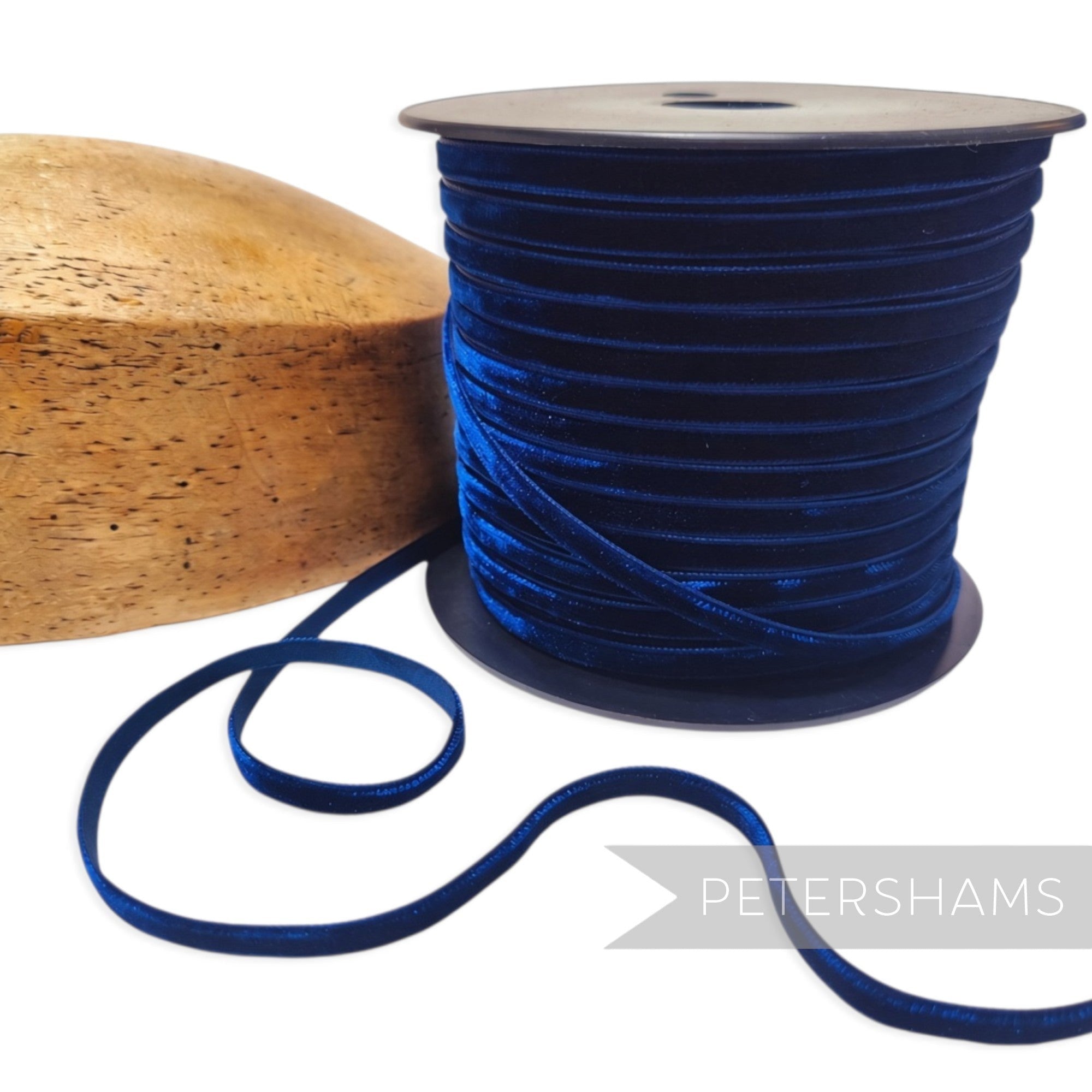 Petershams Millinery Supplies 7mm navy blue French velvet ribbon on a spool