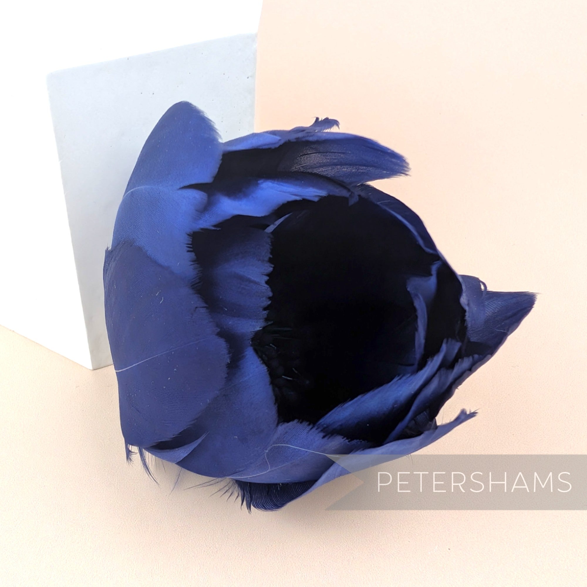 Petershams Millinery Supplies large navy blue tulip flower made from cupped goose nagorie feathers with central stamens