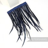 Petershams Millinery Supplies extra long navy blue goose biot feather fringe on a stitched satin ribbon binding.