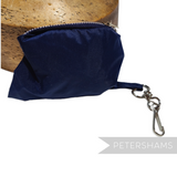 Petershams Millinery Supplies vintage navy blue nylon fold-up bucket hat storage pouch with metal keychain clip