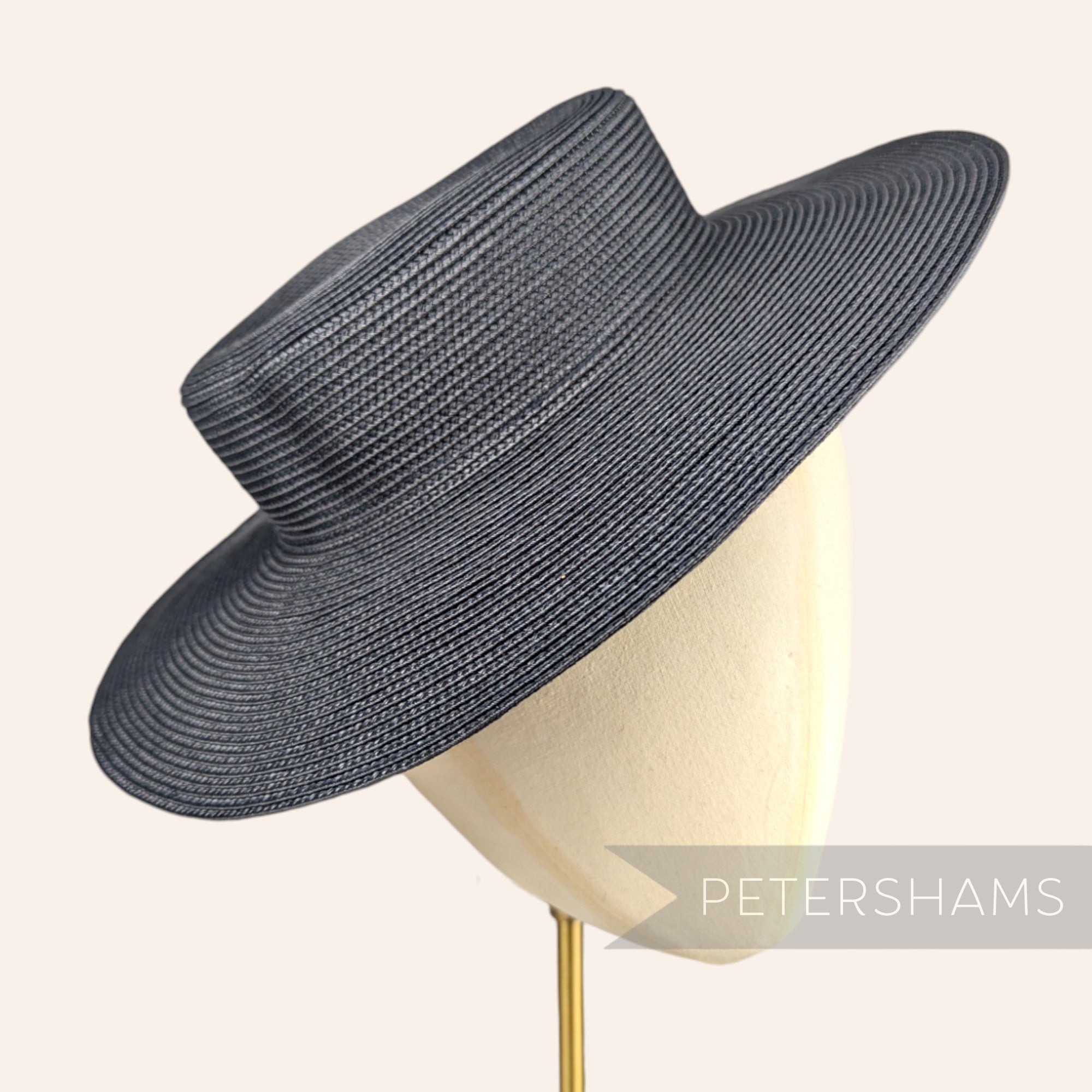 Petershams Millinery Supplies navy blue spiralled polybraid boater fascinator hat base on a mannequin head