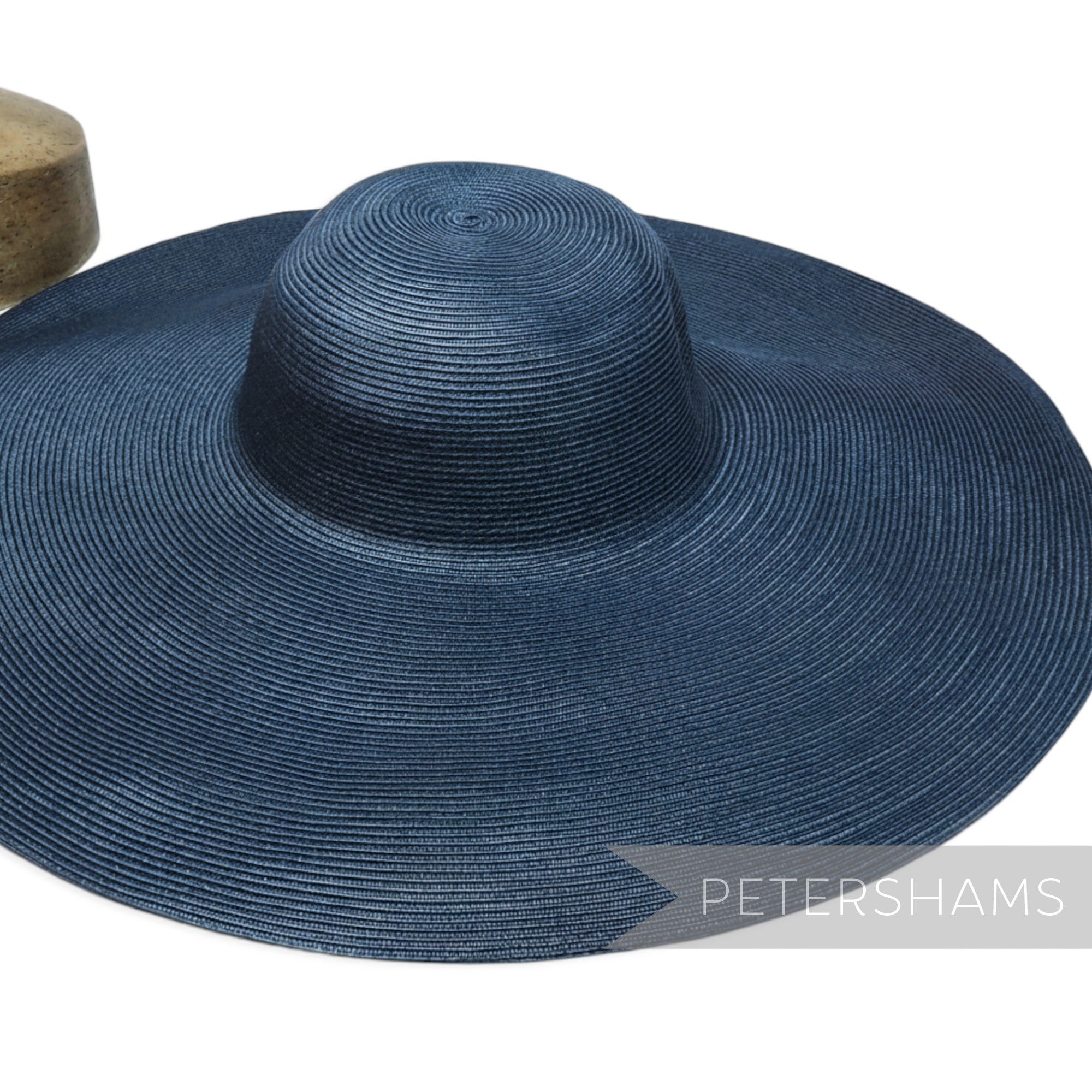 Petershams Millinery Supplies XL navy blue polybraid capeline hat body with a wide brim and satin finish.