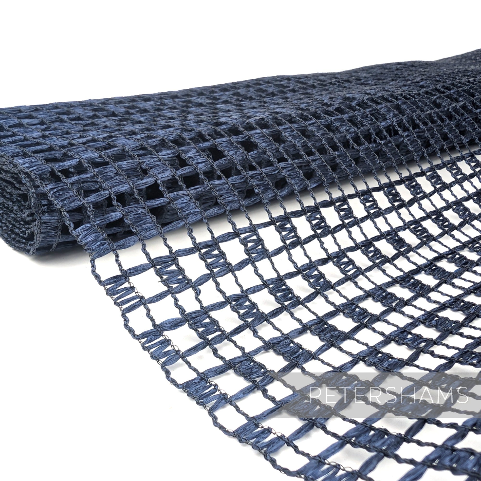 Petershams Millinery Supplies vintage navy blue laminated raffia mesh fabric with a checkerboard weave pattern.