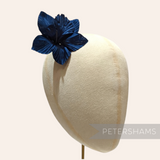 Petershams Millinery Supplies Coco navy blue silk orchid flower hat mount on a millinery display head