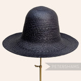Petershams Millinery Supplies vintage navy blue toquilla straw capeline hat body with fine plaited stripe pattern.