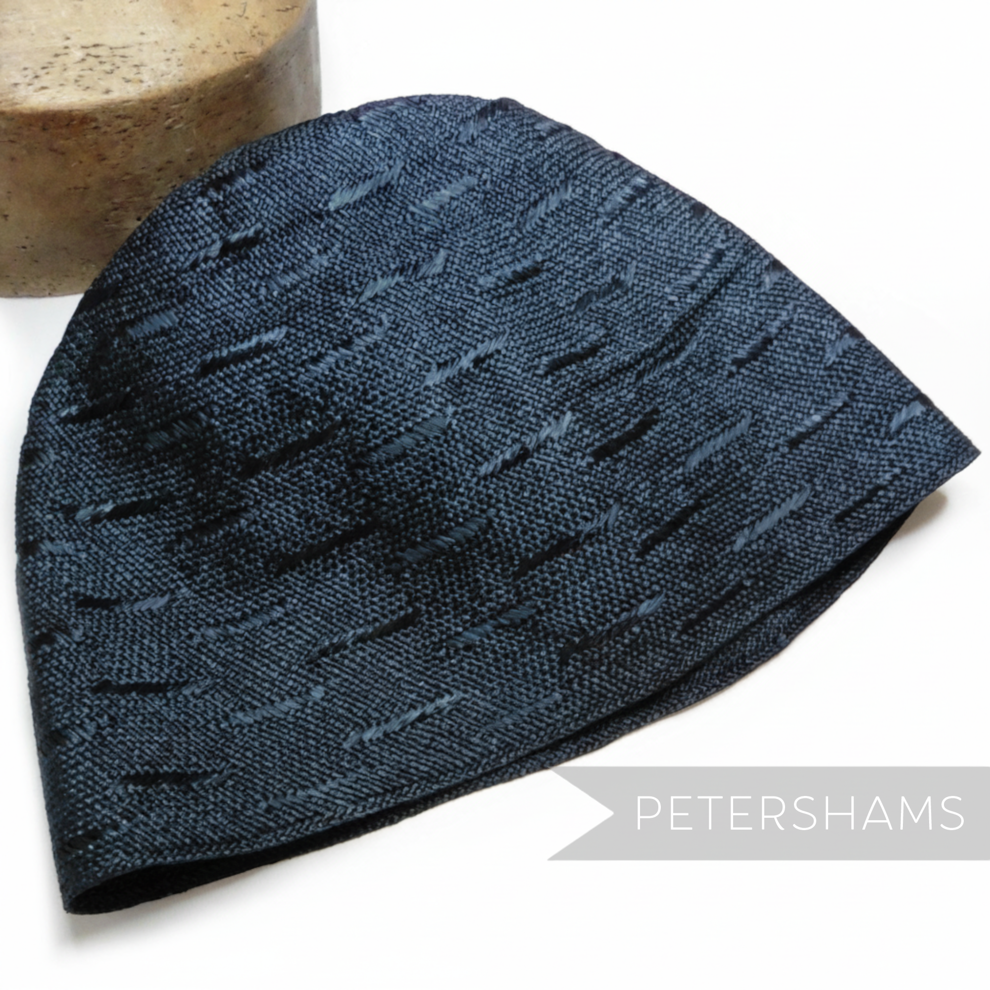 Petershams Millinery Supplies vintage navy blue visca hat body with a woven dash pattern for millinery projects.