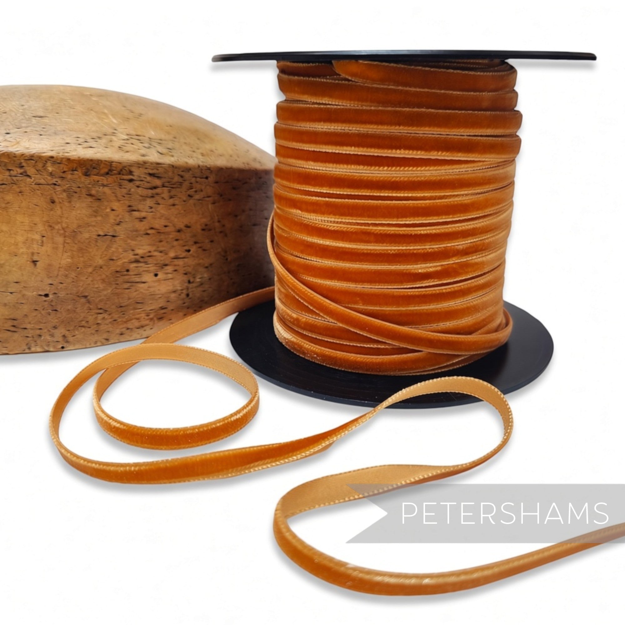 Petershams Millinery Supplies 7mm warm rust French velvet ribbon on a spool