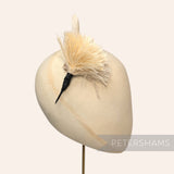 Petershams Millinery Supplies cream ostrich and goose feather hat mount with a black wired stem