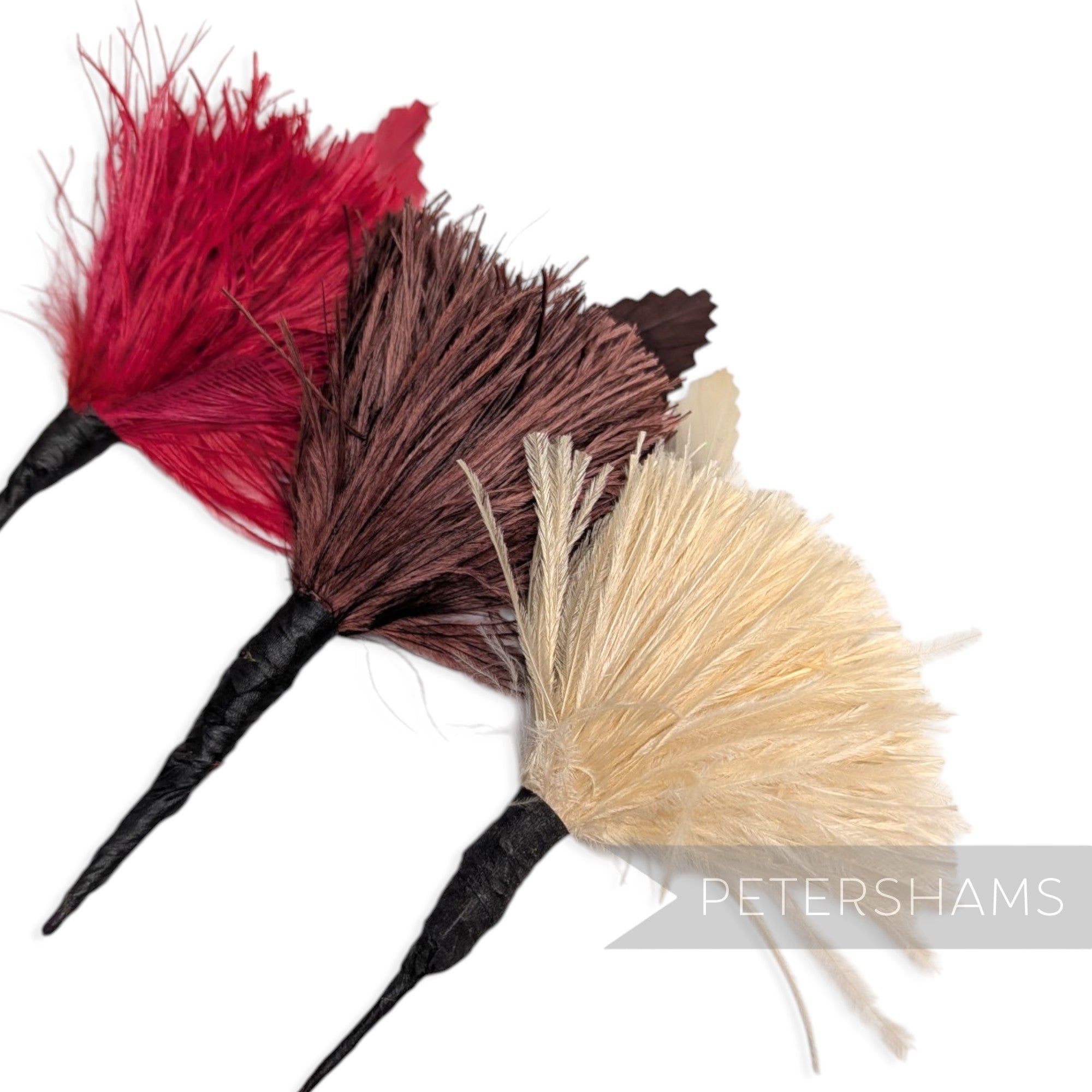Petershams Millinery Supplies ostrich plume and zig zag goose feather hat mounts in red, brown, and warm ivory on wire stems
