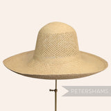 Petershams Millinery Supplies vintage Ecuador Panama straw capeline hat body with a basket vent crown design.