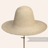 Petershams Millinery Supplies vintage Ecuador Panama straw capeline hat body with a light open weave design.