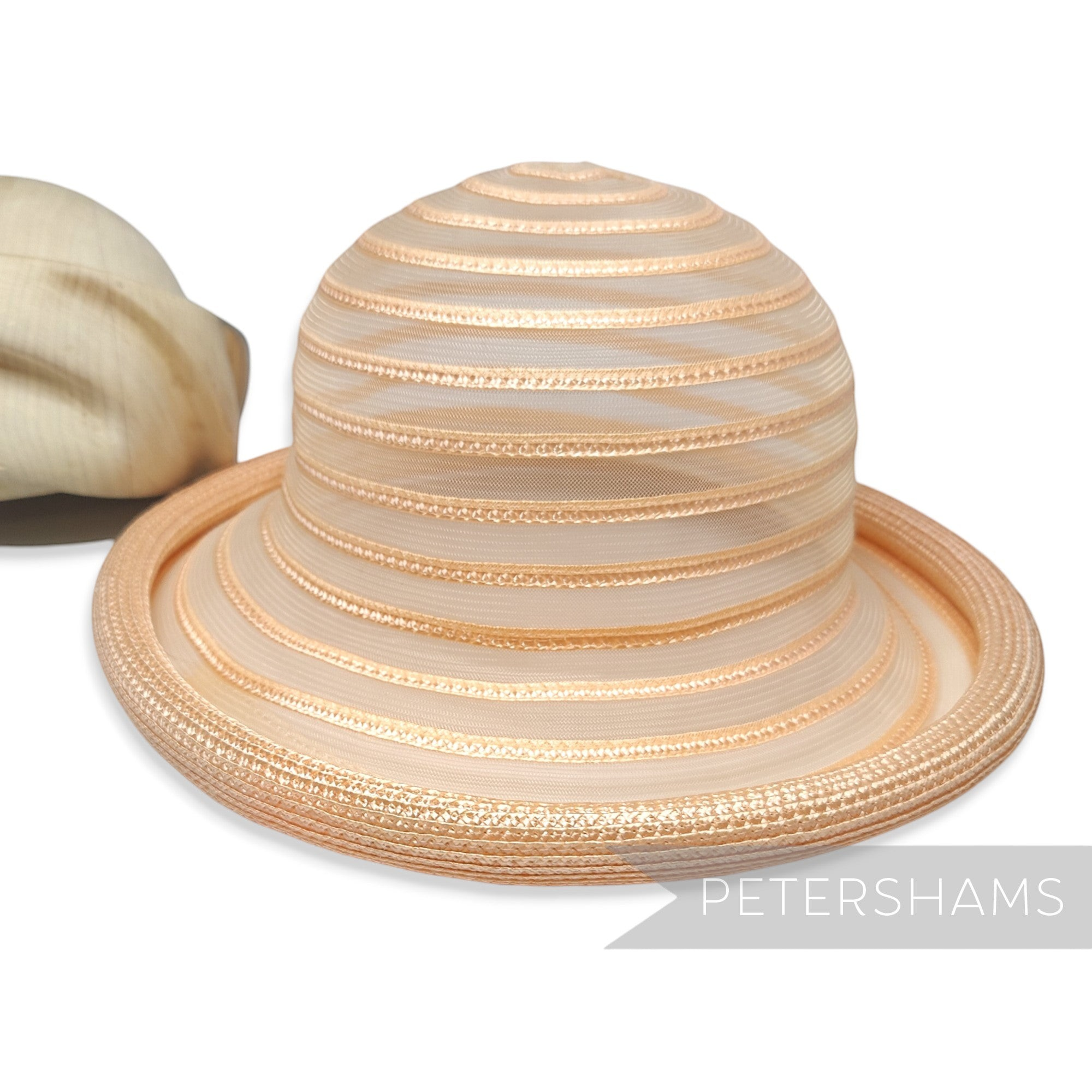 Petershams Millinery Supplies vintage 1990s peach crinoline and poly-braid hat base with a chunky rolled brim edge.