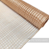 Petershams Millinery Supplies peachy pink basket weave sinamay fabric with a large open weave, ideal for hat making.