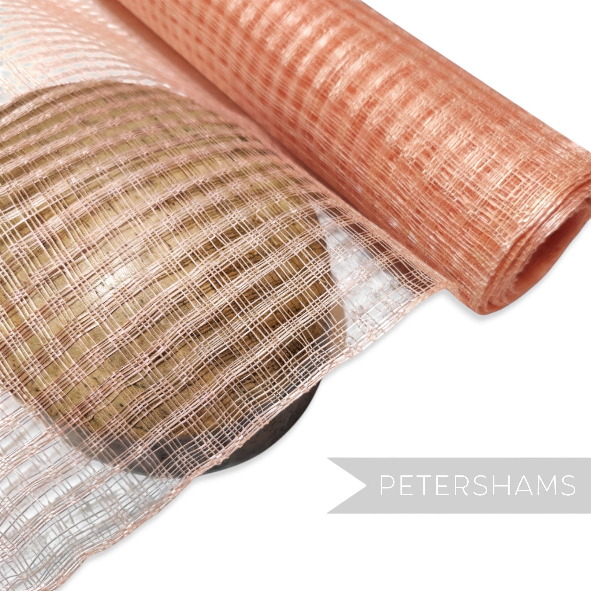 Petershams Millinery Supplies peachy pink basket weave sinamay fabric for hat making and trims. Lightweight, natural straw fibre.