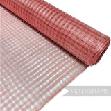 Petershams Millinery Supplies peachy pink basket weave sinamay fabric for hat making and fascinators.