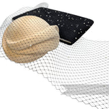 Petershams Millinery Supplies black diamond-patterned veiling with ivory pearls draped over a wooden hat block