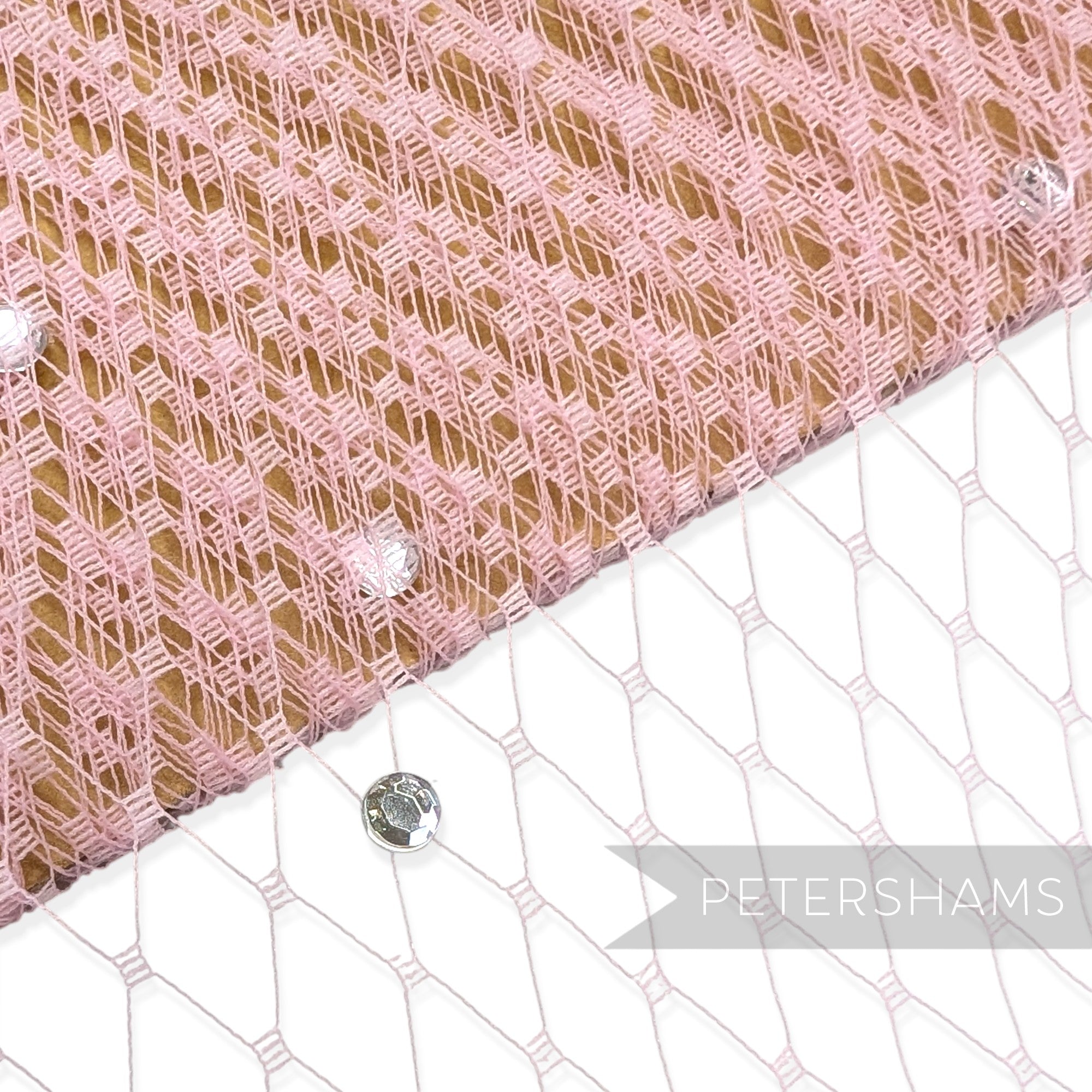 Petershams Millinery Supplies pink diamond-patterned veiling embellished with clear acrylic diamantes for millinery.