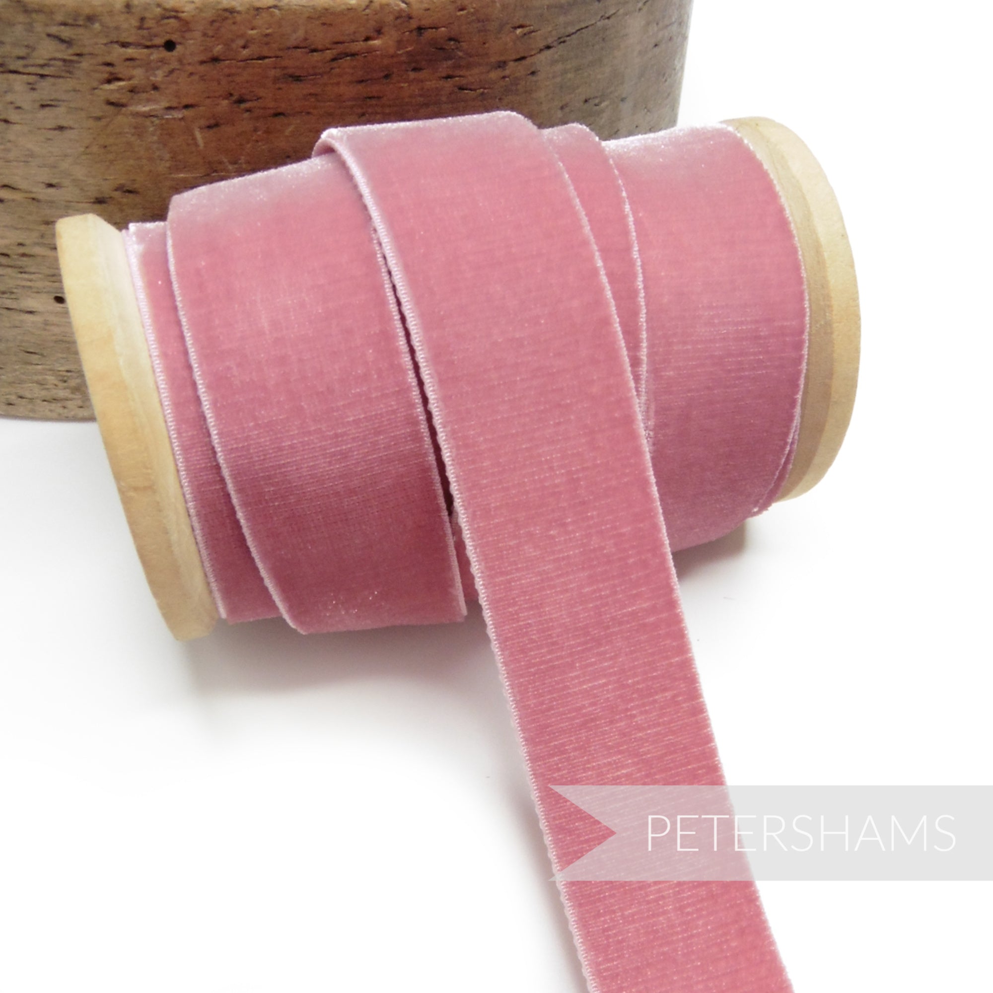 Petershams Millinery Supplies 23mm dusty pink elastic stretch velvet ribbon on a wooden spool for millinery projects