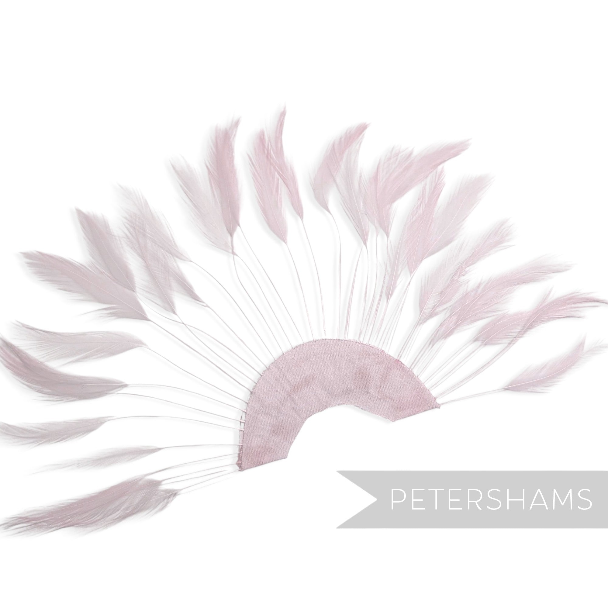 Petershams Millinery Supplies heather  stripped hackle feather fan on a cotton base for hat and fascinator trimming.