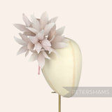 Petershams Millinery Supplies Kay large rose pink goose feather pom flower hat mount on a millinery display head.