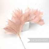 Petershams Millinery Supplies large spiky rose pink goose feather hat mount on a wired stem for millinery projects.