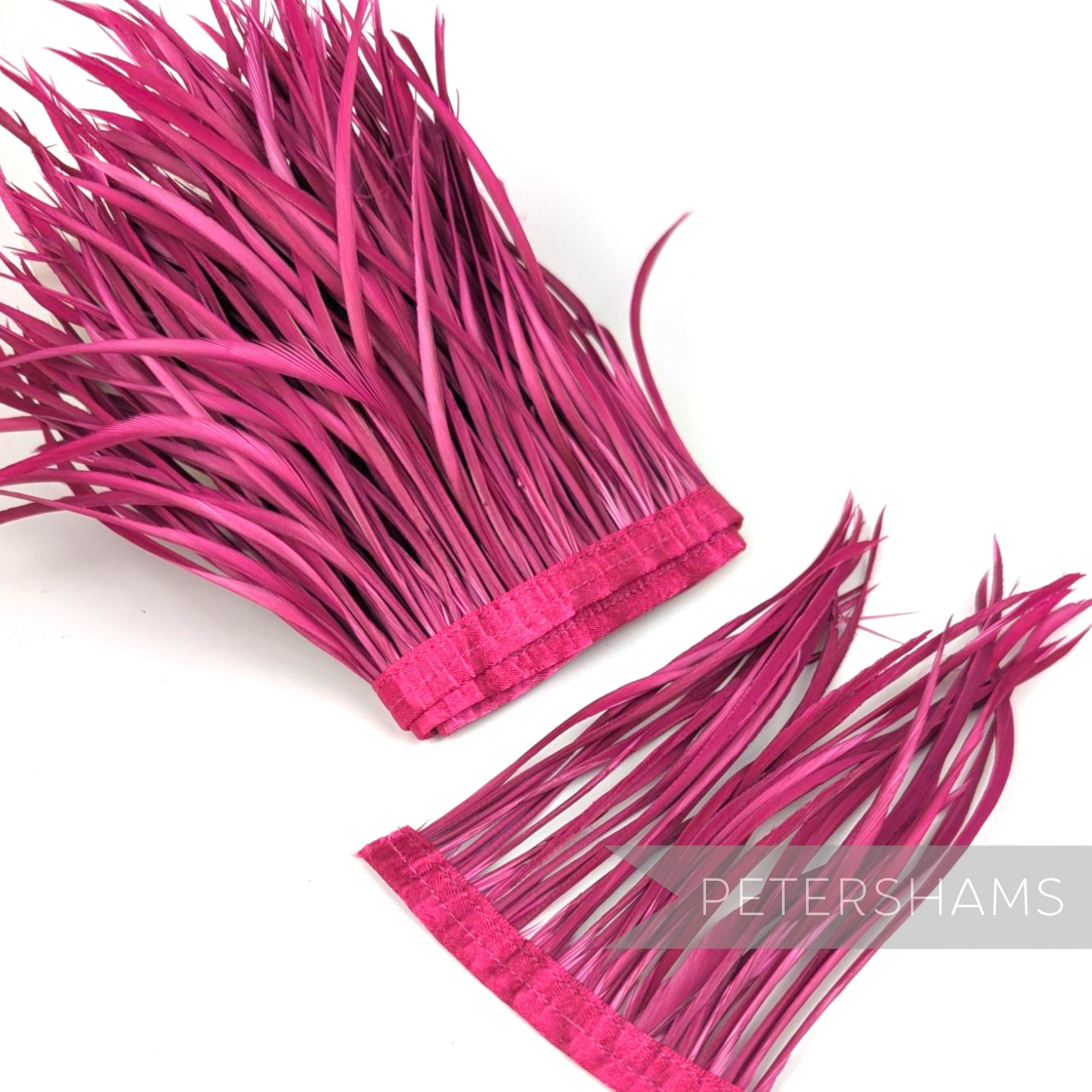 Petershams Millinery Supplies extra long cerise pink goose biot feather fringe on a stitched satin ribbon binding