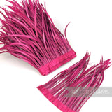 Petershams Millinery Supplies extra long cerise pink goose biot feather fringe on a stitched satin ribbon binding