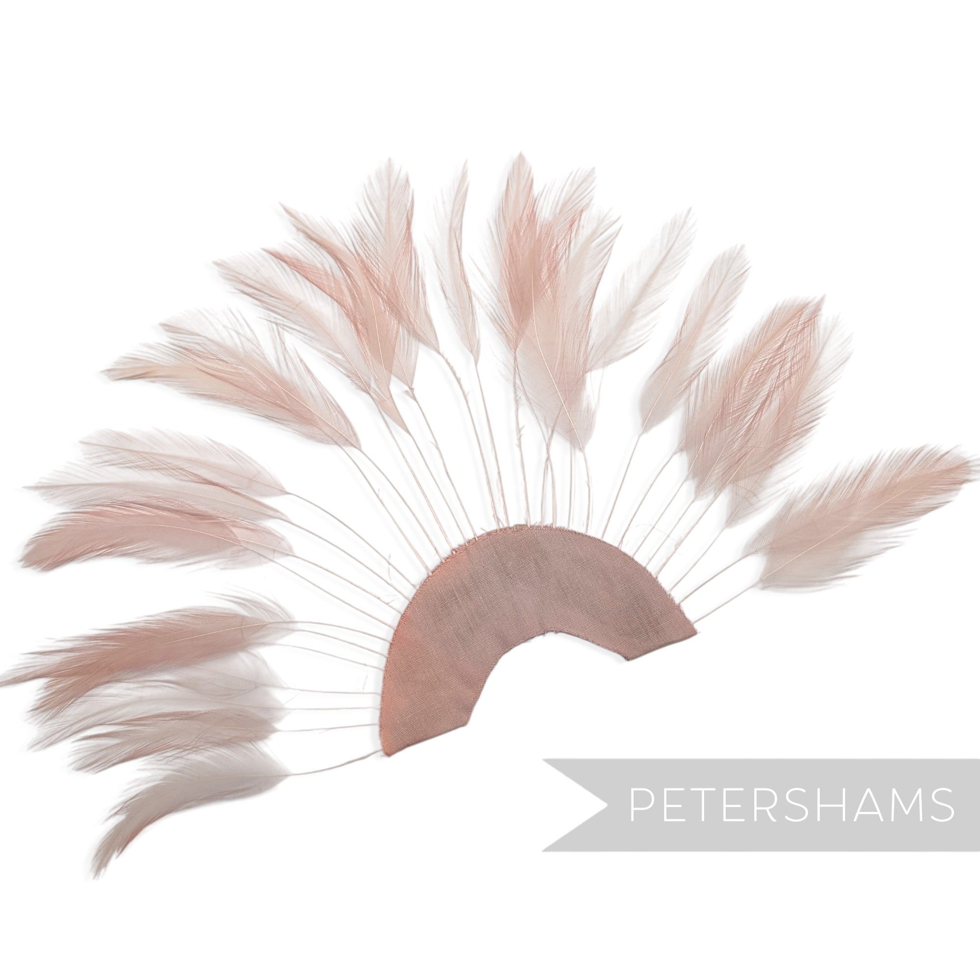 Petershams Millinery Supplies dusky pink stripped hackle feather fan on a cotton base for hat and fascinator trimming.