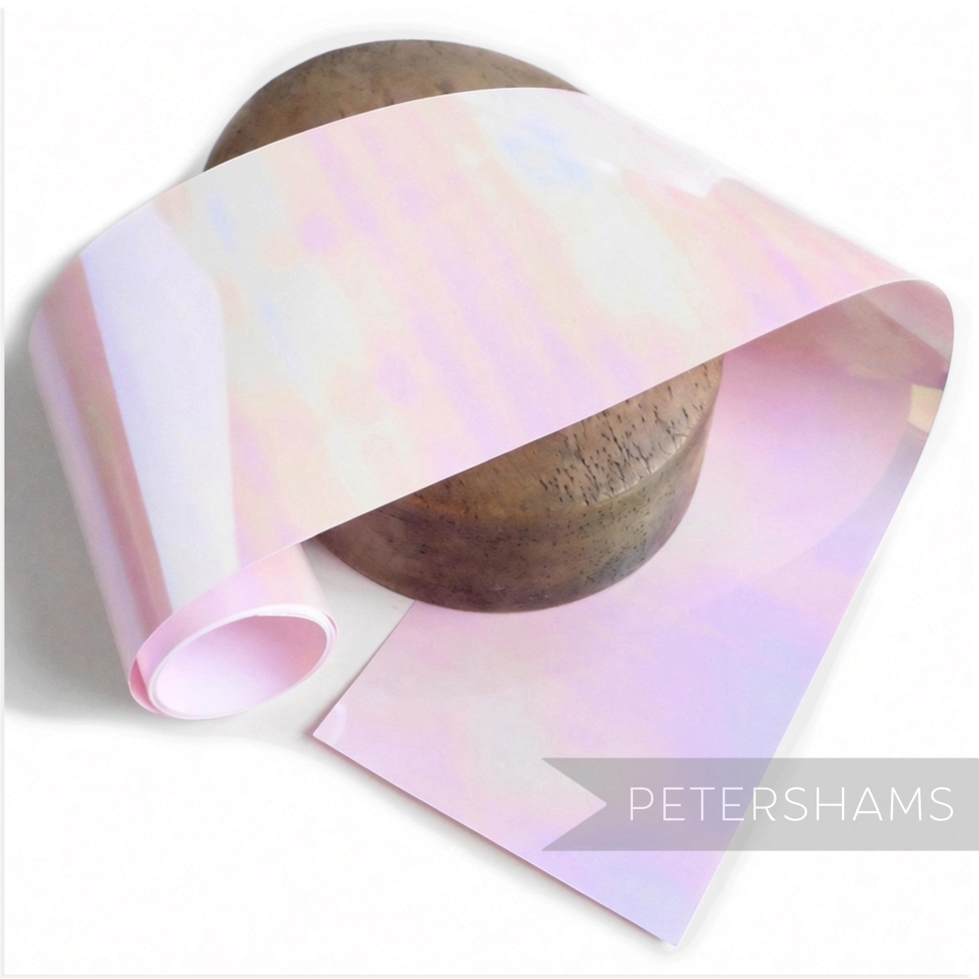 Petershams Millinery Supplies opaque light pink sequin film with an iridescent oil slick finish