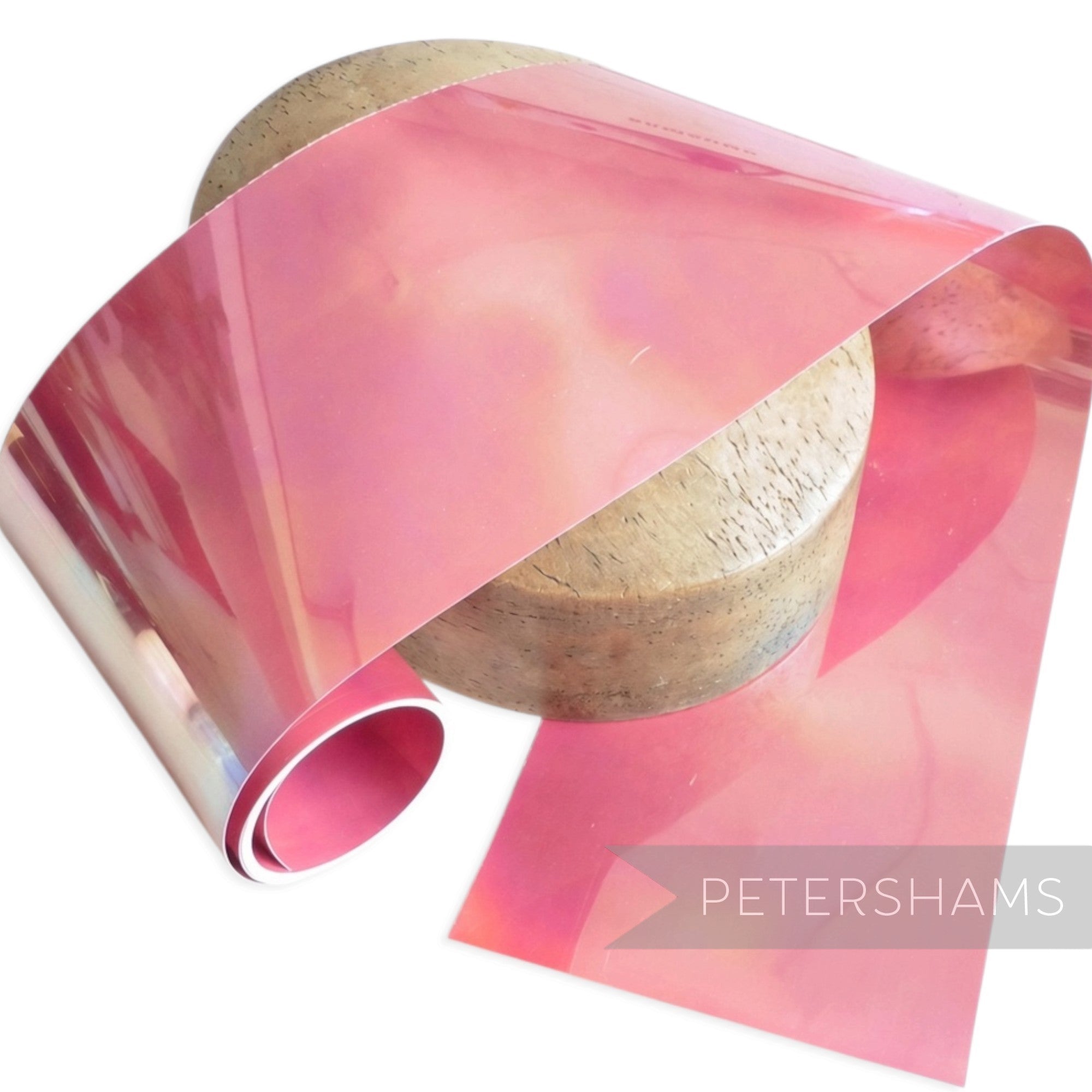 Petershams Millinery Supplies opaque light pink sequin film with an iridescent oil slick finish