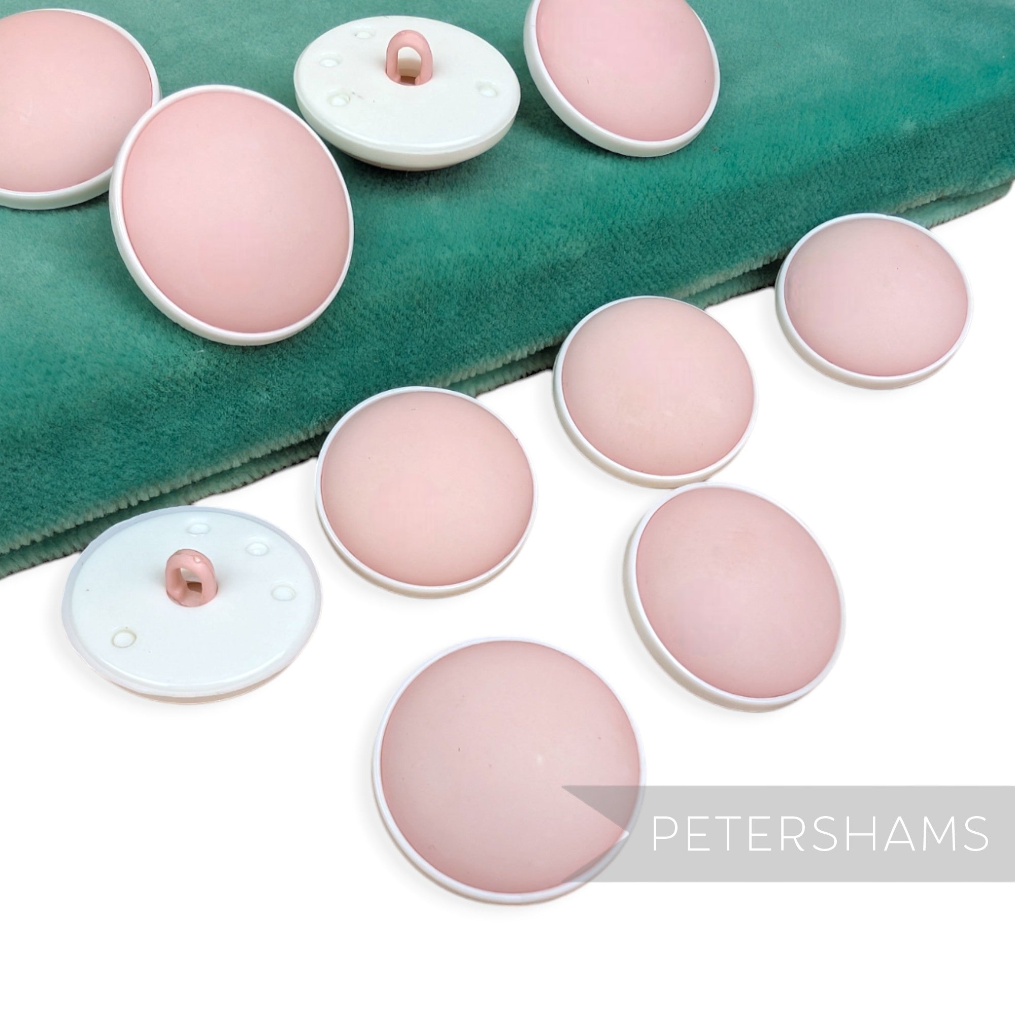 Petershams Millinery Supplies vintage 1960s pink satin-finish low-dome round shank buttons for hats and fascinators.