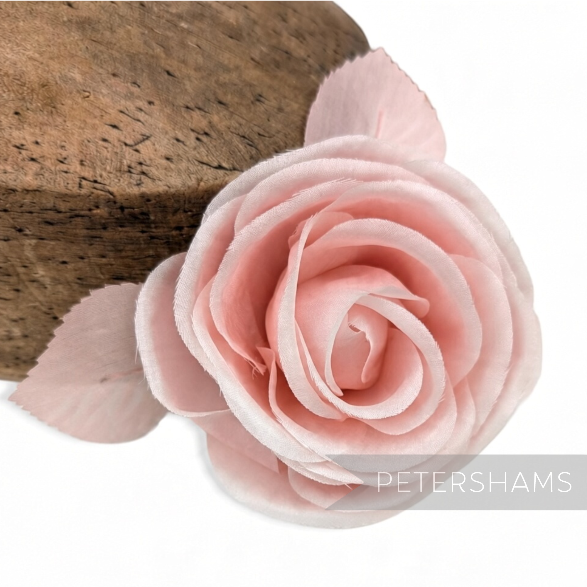 Petershams Millinery Supplies Carmel soft pink silk rose flower hat mount with wired leaves and stem.