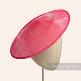 Petershams Millinery Supplies large round fuchsia pink sinamay fascinator hat base on a millinery head form