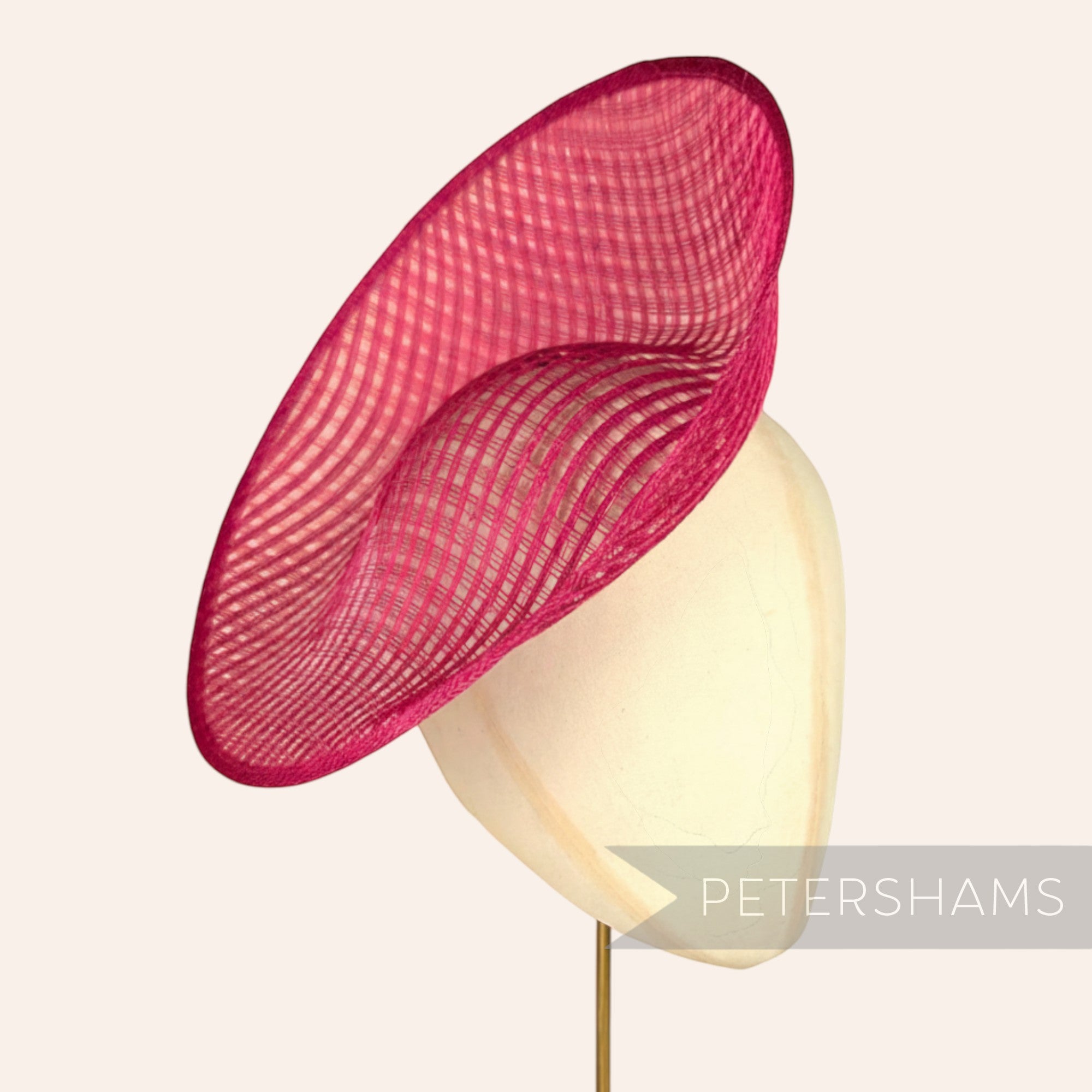 Petershams Millinery Supplies Amanda lattice weave sinamay fascinator base in fuchsia pink with a curved scoop design.