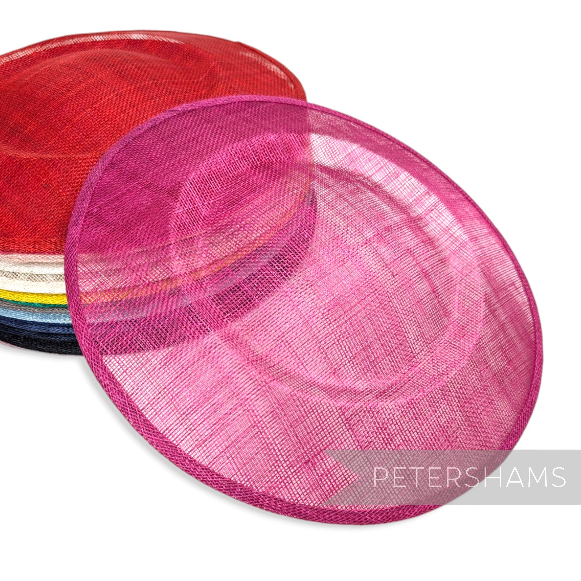 Petershams Millinery Supplies large round pink sinamay fascinator hat base with a shallow crown for millinery projects.