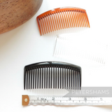 Petershams Millinery Supplies black, tortoise brown, and clear plastic hair combs, 9.5cm wide, ideal for hat making.