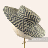 Petershams Millinery Supplies small brim polybraid boater fascinator hat base in a black and straw chevron pattern.