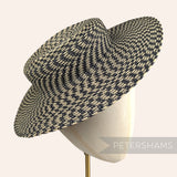Petershams Millinery Supplies small brim boater fascinator hat base in a black and straw spiralled polybraid weave.