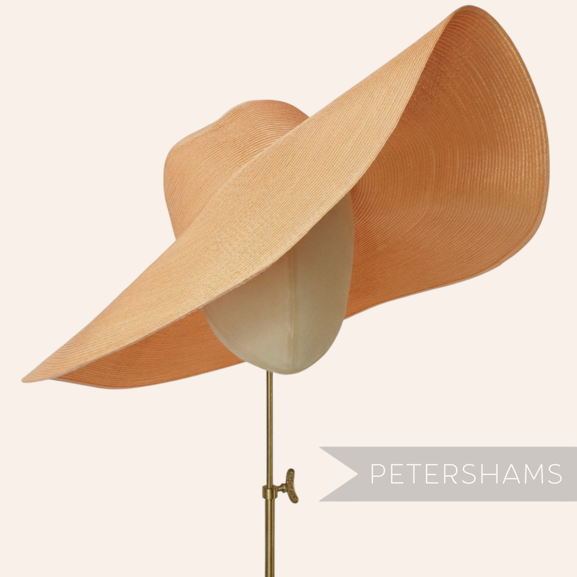 Petershams Millinery Supplies XL peach polybraid capeline hat body with a wide, undulating brim