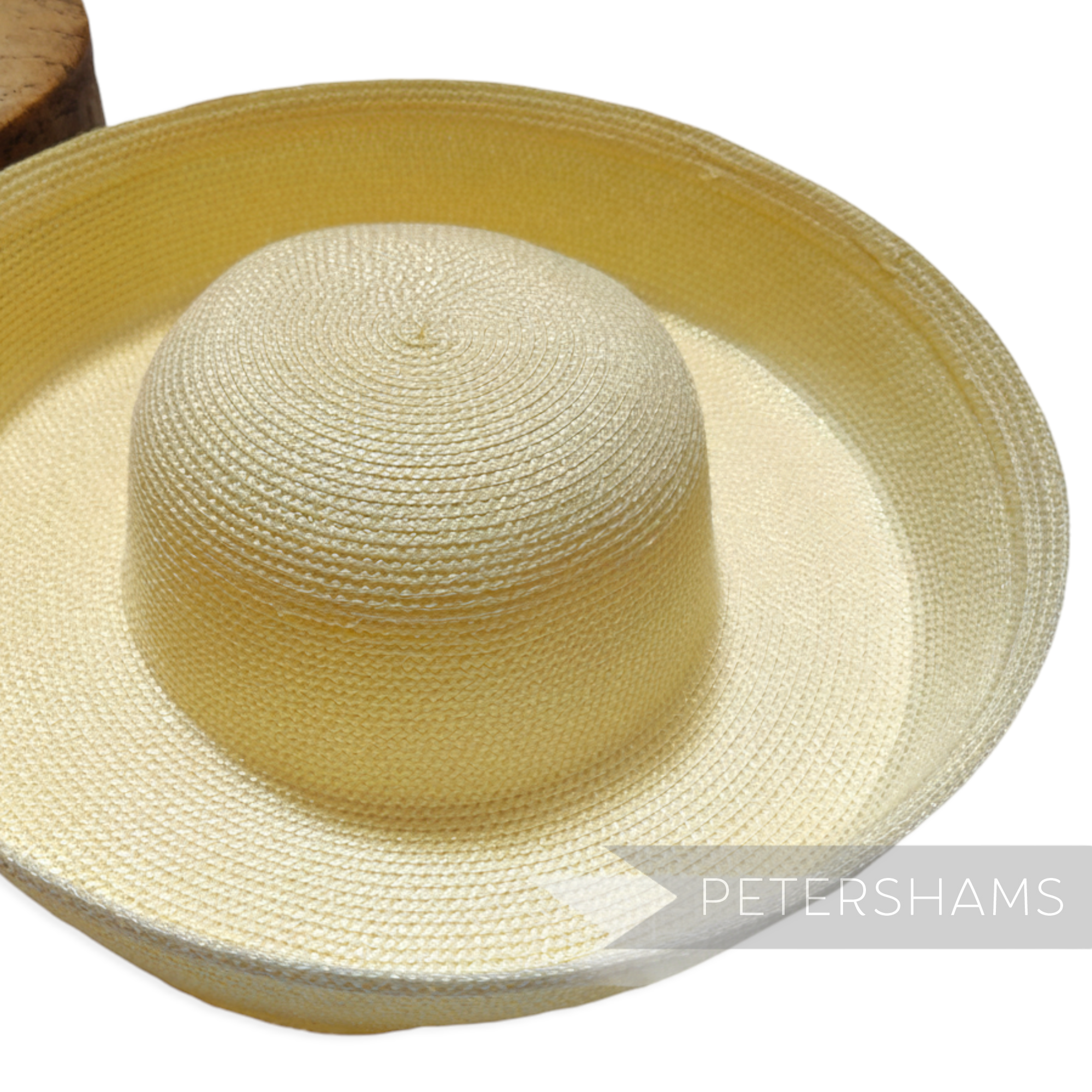 Petershams Millinery Supplies pale yellow polybraid sailor hat form with a large upturned brim, ideal for race hats and mothers of the bride.