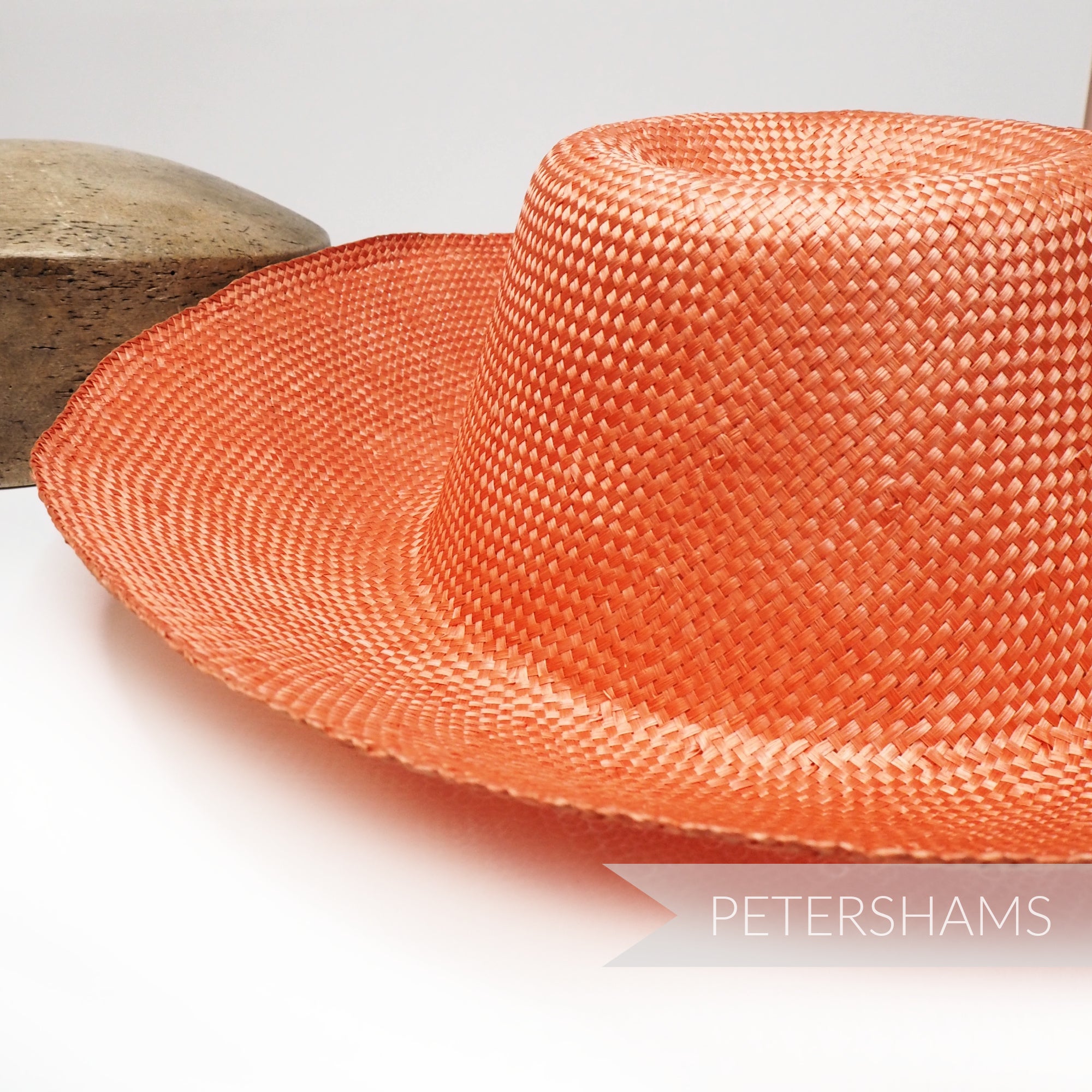 Petershams Millinery Supplies pumpkin ramie straw capeline hat body with a 1x1 checker weave pattern