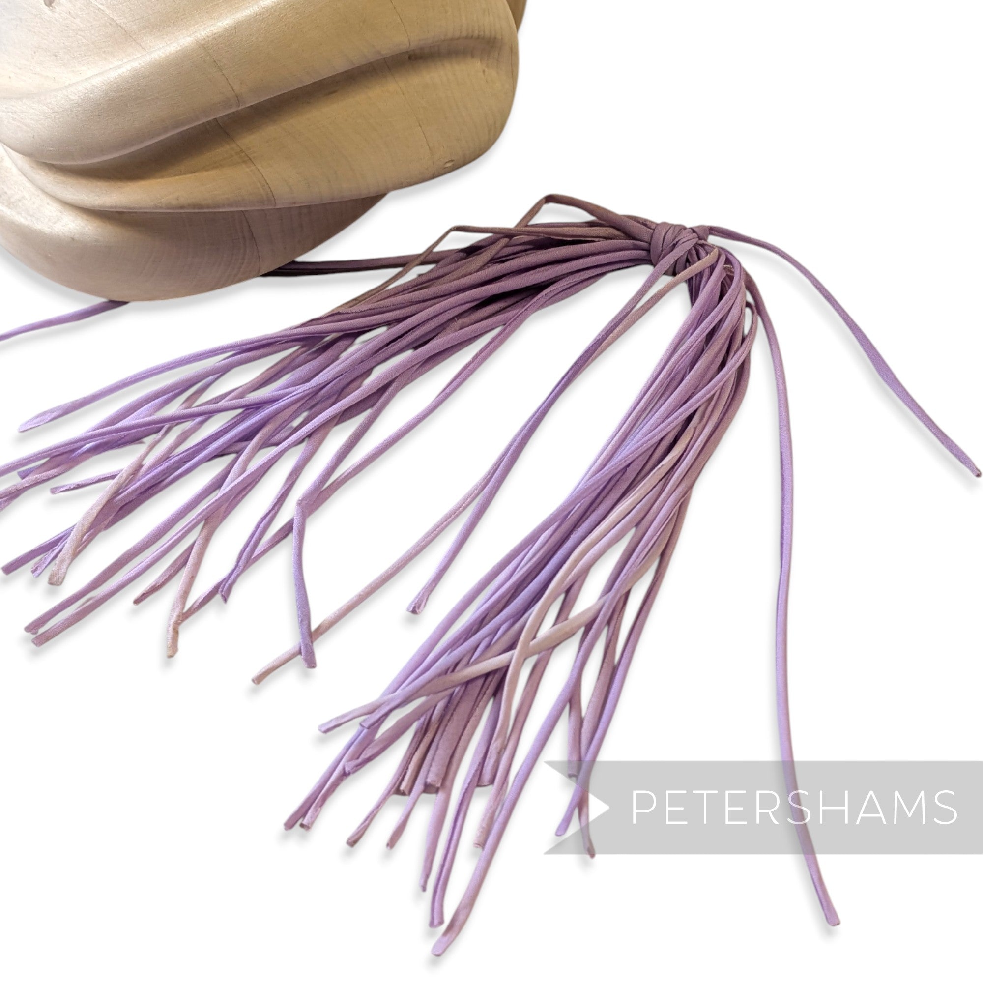 Petershams Millinery Supplies vintage purple rolled cotton organdie flower tails for millinery and craft projects.