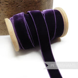 Petershams Millinery Supplies 16mm deep purple elastic stretch velvet ribbon on a wooden spool