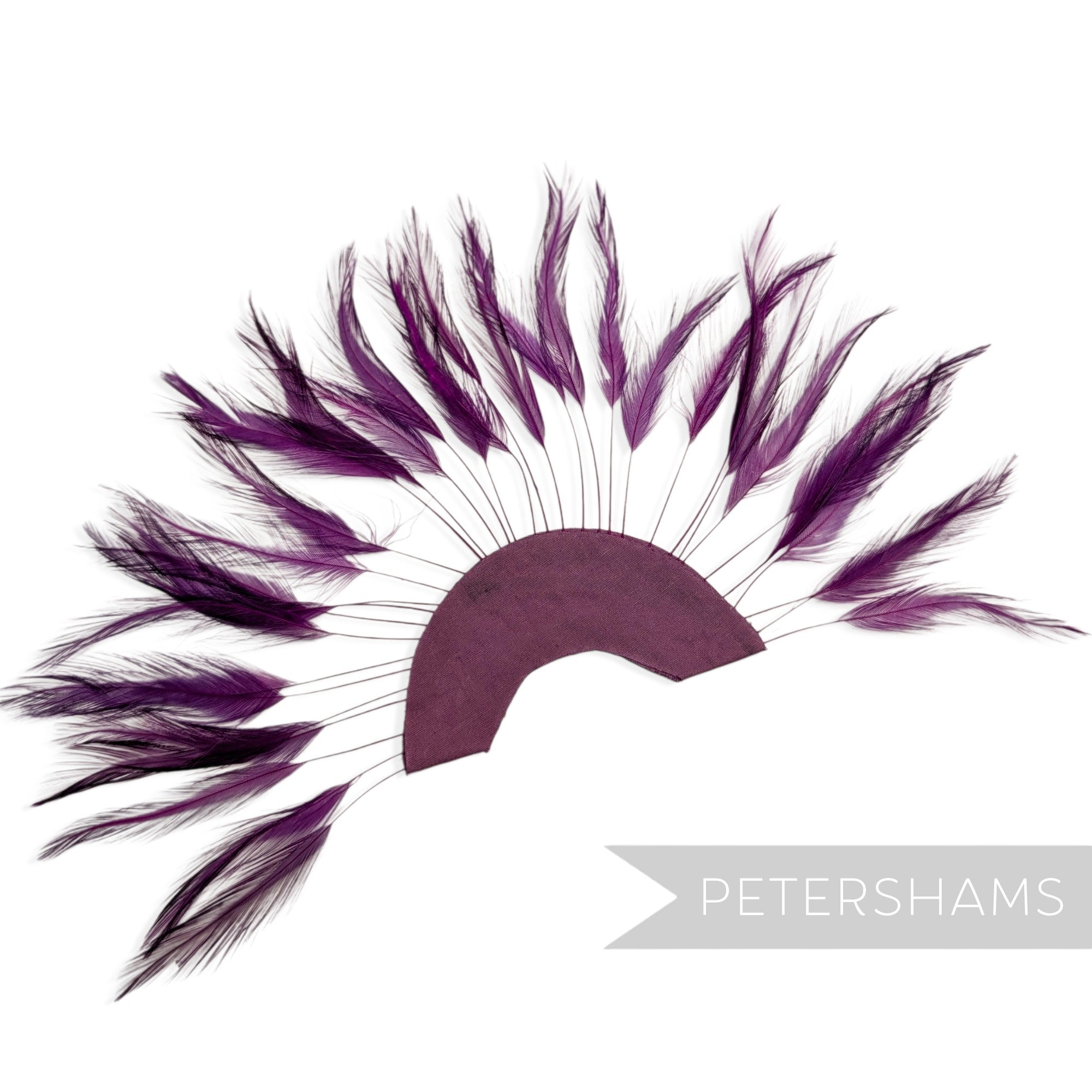 Petershams Millinery Supplies purple stripped hackle feather fan on a cotton base for hat and fascinator trimming.